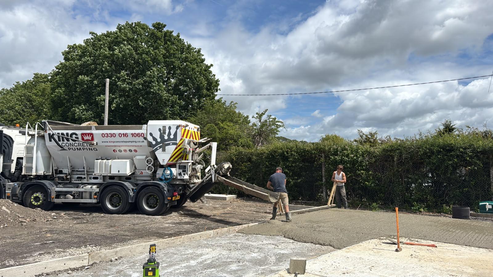 King Concrete Pumping crew placing concrete on a Kingston site